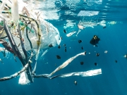 Sea pollution, plastic floating under water