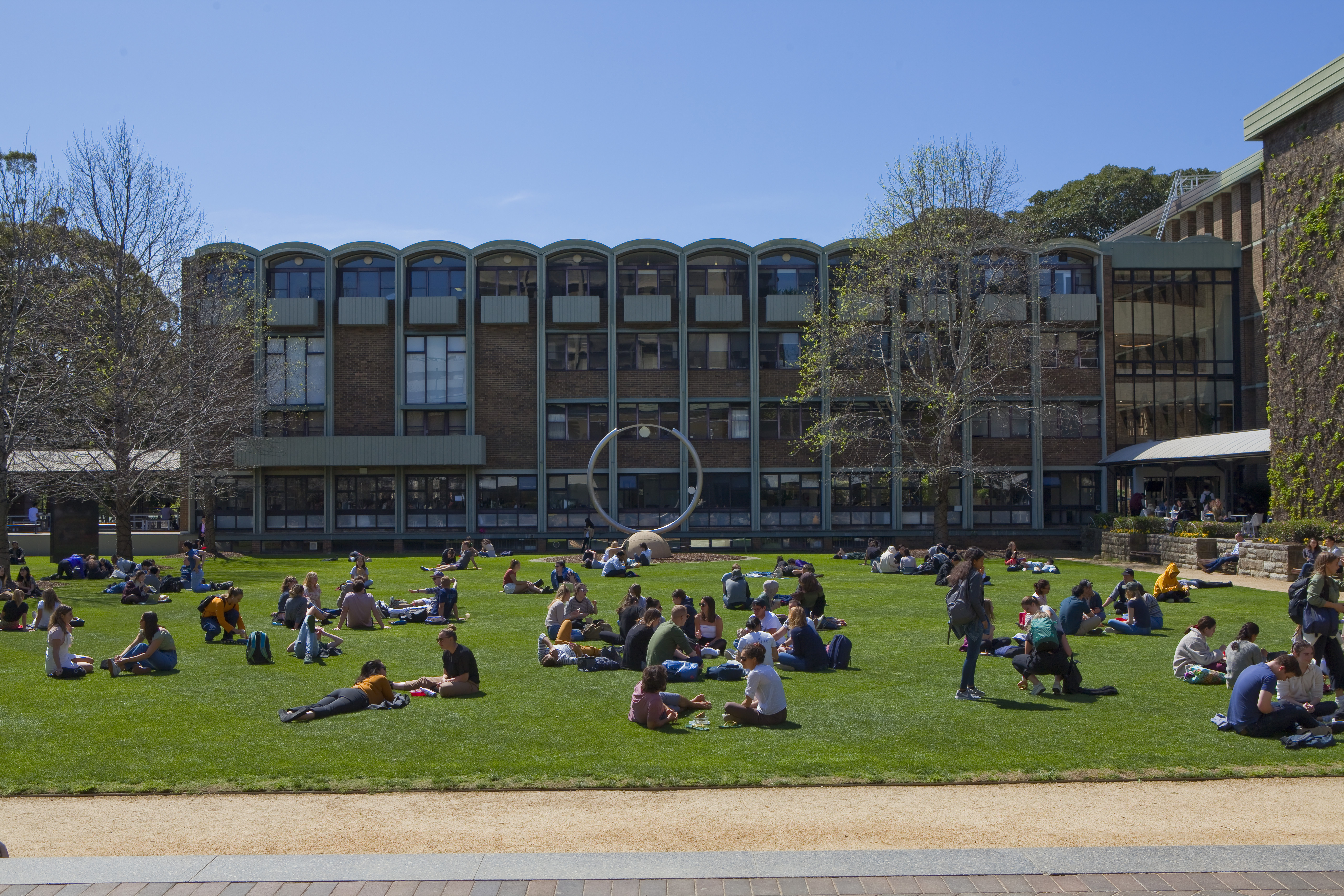UNSW Campus with students on grass