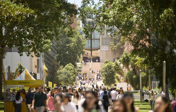 Students bustling around the main walkway at UNSW on Info Day 2023
