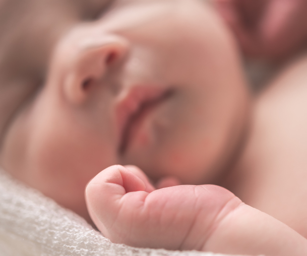 Close up of a sleeping newborn baby
