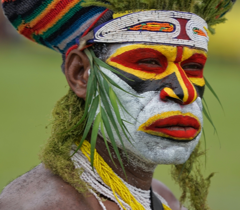 Male with traditional face paint in Papua New Guinea