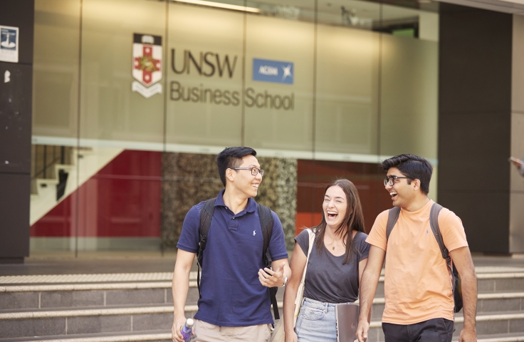 3 students in front of the UNSW Business School 