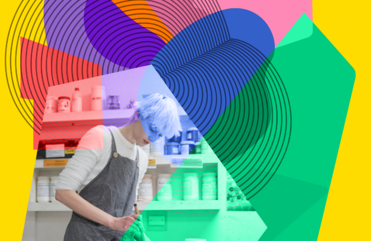 A colourful graphic design overlays an image of a person in a workshop. 