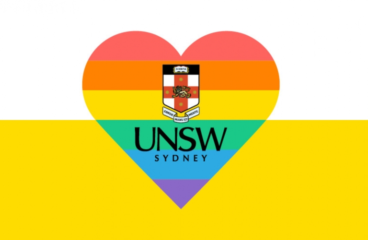 A rainbow heart with the UNSW logo in the centre. The background is white on the top and yellow on the bottom. 
