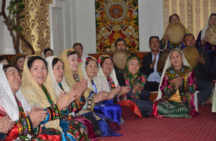 Uyghur women sitting in a group 